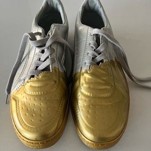 PUMA men silver and gold sneakers